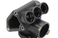 LSC 021121117A : Left Front Coolant Water Thermostat Flange for VW - NEW